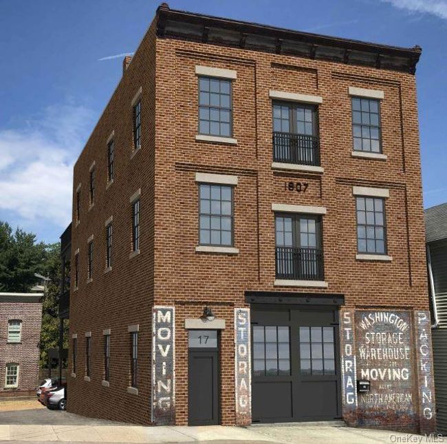 Live in a local historic landmark which was once the largest moving and storage company in the county! Converted in 2022 to three gorgeous condos. | Image 25