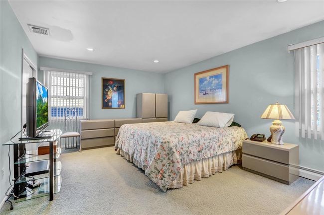 View of carpeted bedroom | Image 19