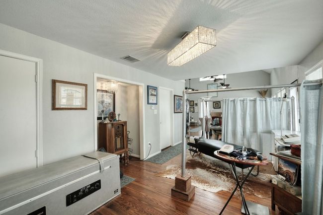 Office area with dark wood-style floors | Image 14