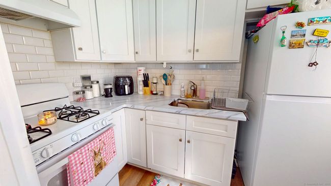 79 Albany Ave, Home with 6 bedrooms, 3 bathrooms and null parking in New Britain CT | Image 5