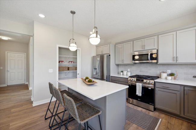 Desired kitchen pantry. This is not the actual home for sale, but photos of the same floorplan. Additional options may be shown. | Image 8