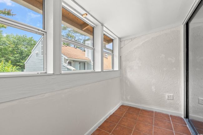 Unfurnished sunroom featuring healthy amount of natural light | Image 22