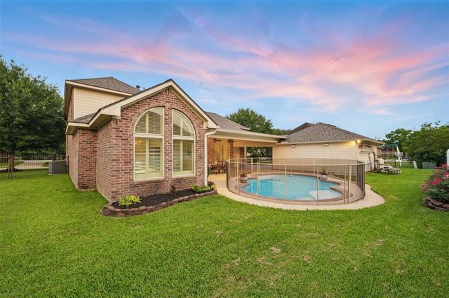 Both sides of the home have expansive side yards for more play, pets or gardening. | Image 41