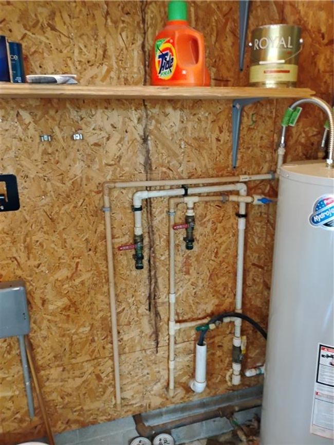 Garage Utility room featuring hook up for water softener | Image 77