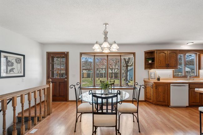 Bright and cheerful space with access to the backyard and patio. | Image 7