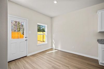 Bright and airy breakfast area. | Image 2