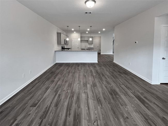 The Sparrow II- Family Room in Kitchen. Home under construction. Sample floor plan photo used for illustrative purposes only. Upgrades, selections options, windows and colors may vary. | Image 10