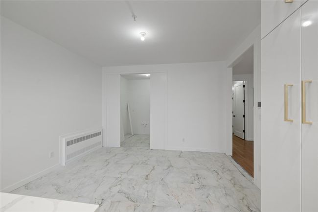 Empty room with baseboards | Image 12