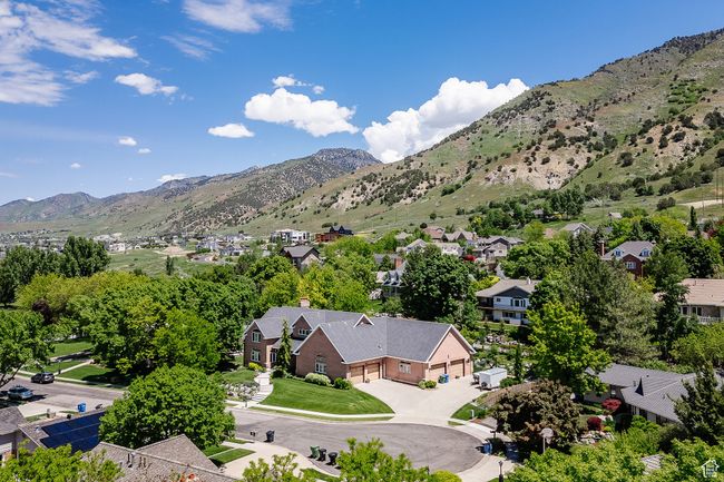 Mountain view featuring nearby suburban area | Image 111