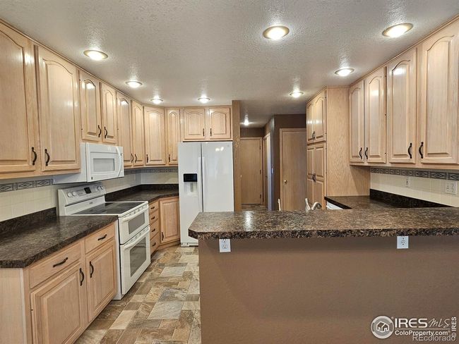 Kitchen is 12 x 11 | Image 9