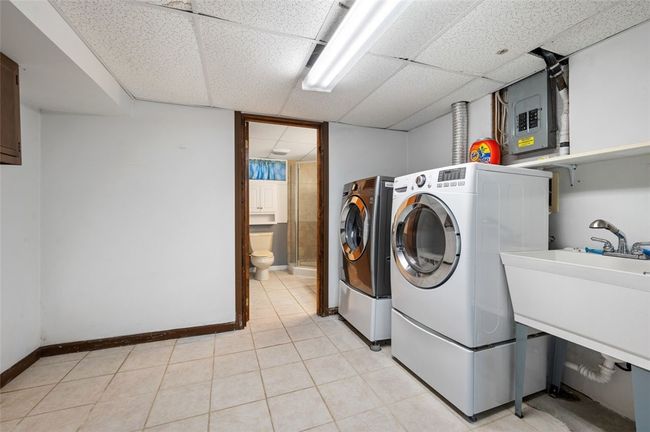 Laundry room on lower level | Image 17