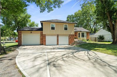 9701 Slater Lane located on large corner lot with widen driveway allowing for extra parking | Image 2