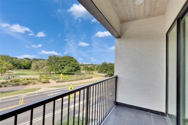 Balcony with view of scattered trees | Image 20