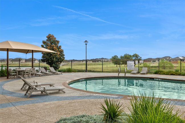 Community pool featuring a patio area | Image 18