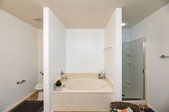 MasterFull bathroom with visible vents, toilet, a jetted tub, and a shower stall | Image 30