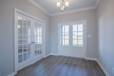 Large Entry Foyer with Wood Flooring and an Elegant Chandelier! | Image 3