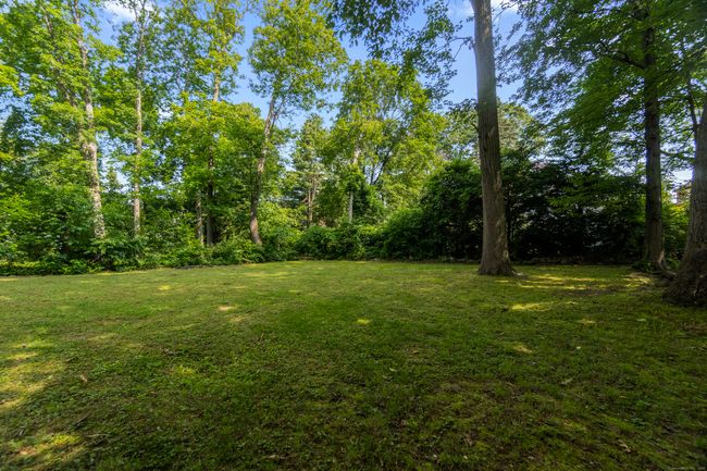 Private, level backyard | Image 29