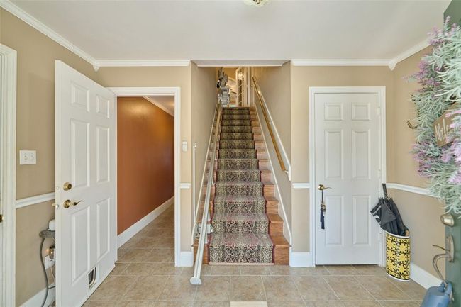 A chair lift for your convenience + possible space with modifications for an elevator | Image 15