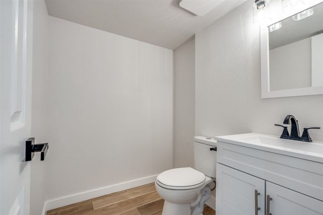 Bathroom featuring wood finished floors and vanity | Image 15