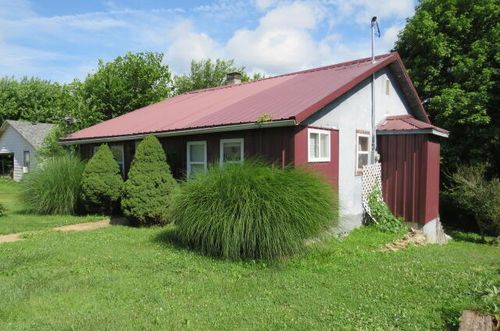 231 E Marshfield St, Hartville, MO, 65667-8203 | Card Image