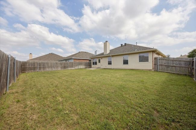 Back of property featuring a chimney | Image 14