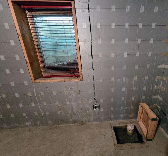 Sewer clean out under wood block | Image 46