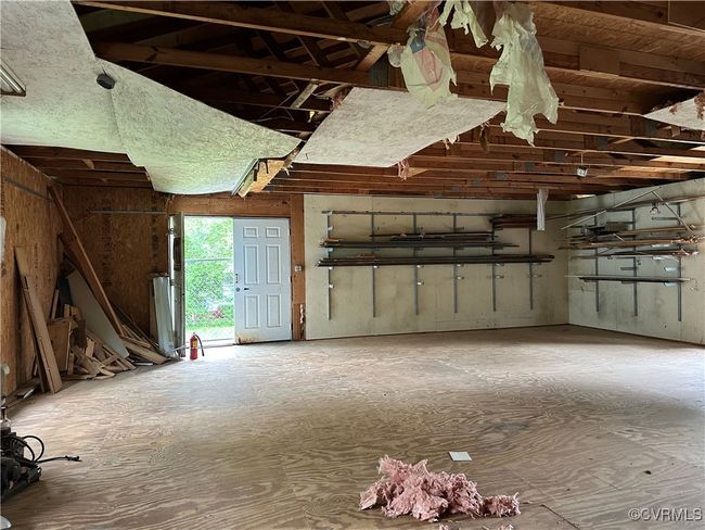 Misc room with a garage | Image 10