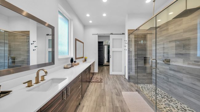Full bath with vanity, a stall shower, wood finished floors, and recessed lighting | Image 21