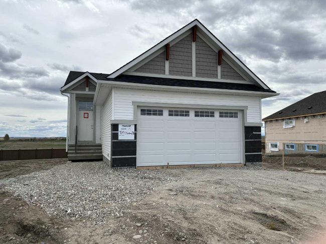 307 Monterey Drive Se, Home with 3 bedrooms, 3 bathrooms and 4 parking in High River AB | Image 1