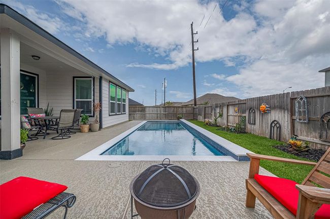 Whether you're hosting weekend BBQs, floating in the sun, or enjoying evening swims under the Texas sky, this home was built for those who live for poolside relaxation and outdoor gatherings. | Image 39