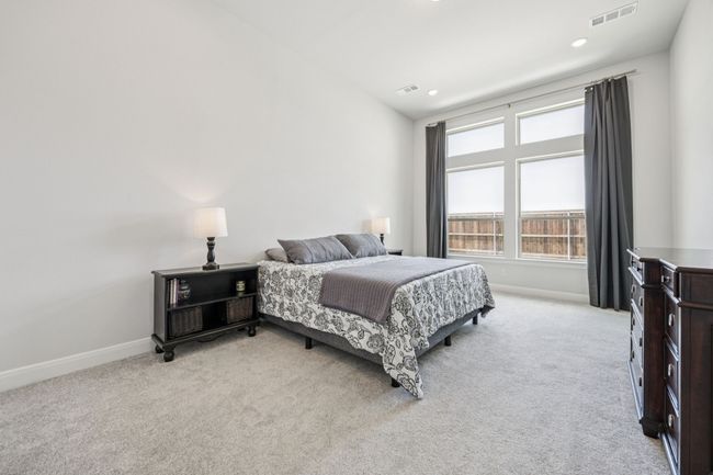 Bedroom with light carpet, baseboards, and recessed lighting | Image 14