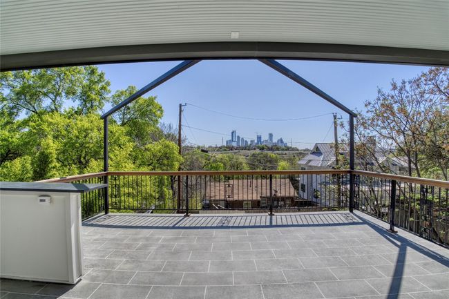 View of the city from main balcony located off the living room | Image 36