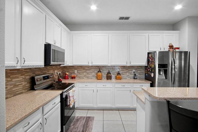 5806 Nw Breezy Brook Ct, House other with 3 bedrooms, 2 bathrooms and null parking in Port St. Lucie FL | Image 11