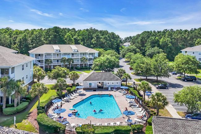 Community pool featuring a patio | Image 26