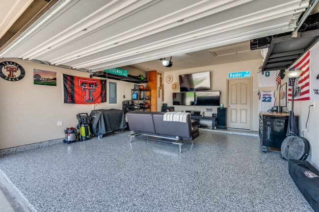 SHINY EPOXY COAT flooring. Extend game days to the neighbors-3 TV's in garage convey! | Image 28