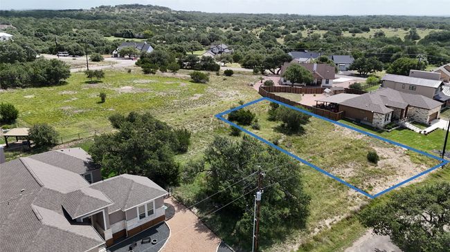Aerial perspective of suburban area with property boundaries highlighted | Image 8
