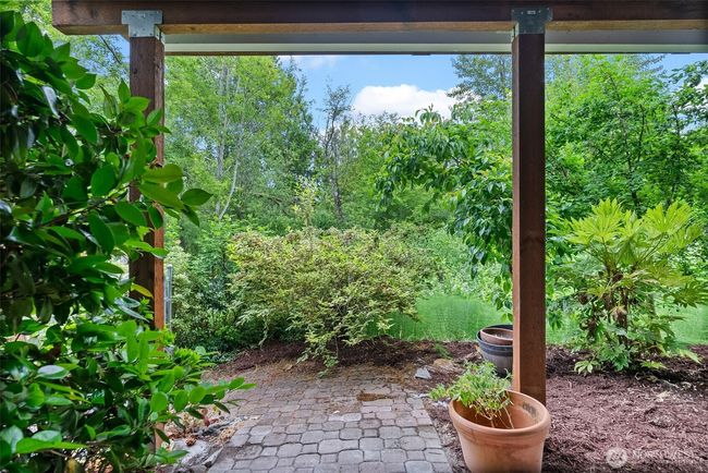 Lower level patio, the deck is sealed so you can have year round outdoor entertaining without dealing with the elements | Image 36