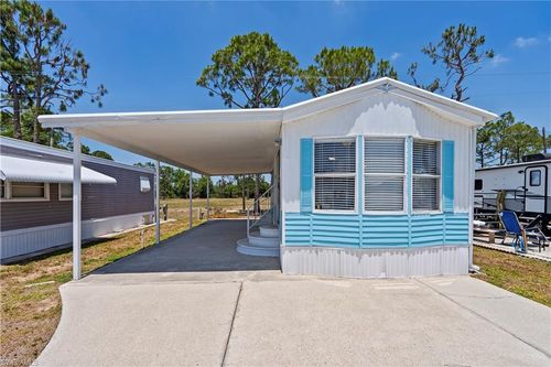 242 Caravan Cir, NORTH FORT MYERS, FL, 33903-7321 | Card Image