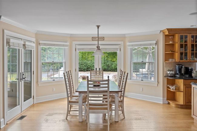 Breakfast Nook overlooking private backyard and access to sunroom | Image 9