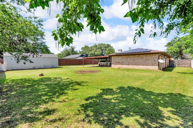 Large back yard with room for a pool if you so desire. | Image 31