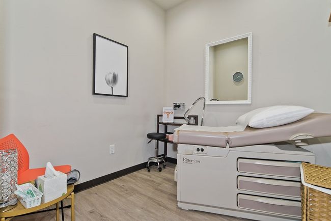Office featuring light wood-type flooring and baseboards | Image 14