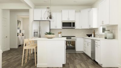 (*Photo of decorated model, actual homes colors and finishes will vary) Enjoy ample cabinet space in this beautiful kitchen | Image 2