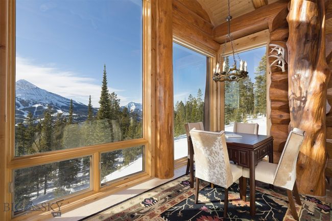 Great room windows to Lone and Fan Mountain views. | Image 43