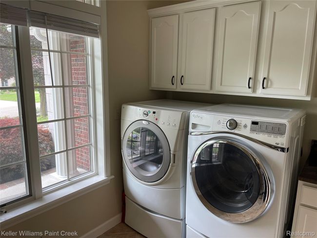 Large Main 1st floor laundry w. plenty of light. | Image 16