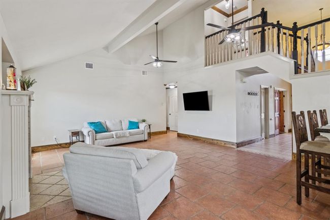 Vaulted ceiling adds character and charm to this home. | Image 20