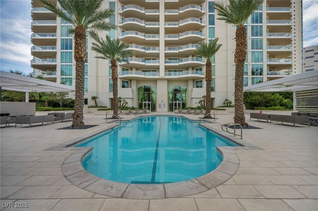 Community pool featuring a pergola, outdoor lounge area, and a patio | Image 69