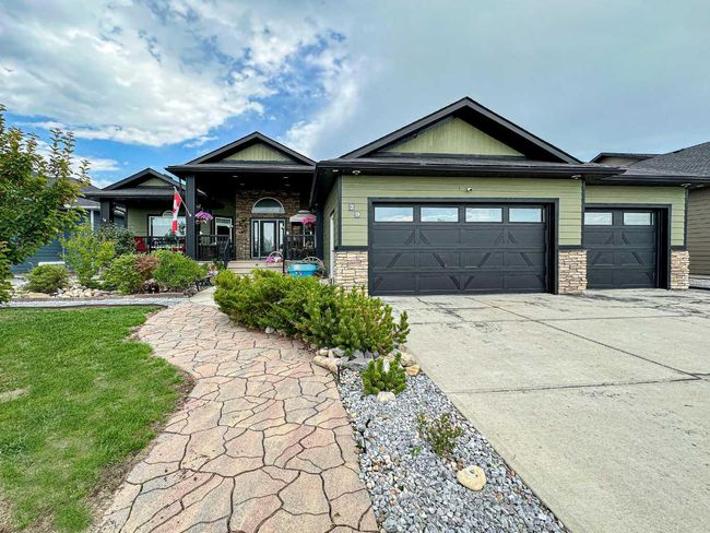 79 Harrison Green, Home with 6 bedrooms, 4 bathrooms and 6 parking in Olds AB | Image 1