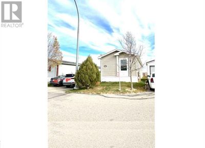 415 Conductor Blvd, House other with 3 bedrooms, 2 bathrooms and 2 parking in Coaldale AB | Image 1