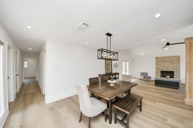 Hallway to bedrooms and dining area | Image 24