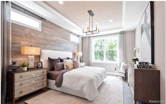 Spacious first-floor primary bedroom suite | Image 7